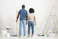 African american couple with paint and instruments, planning home repair Royalty Free Stock Photo