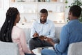 African American Couple With Relationship Problems Sitting At Meeting With Counselor Royalty Free Stock Photo