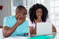 African american couple shocked about computer virus and identity theft