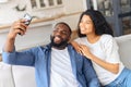 African-American couple takes selfie together at home Royalty Free Stock Photo