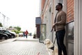 African american disabled man with helpful dog Royalty Free Stock Photo