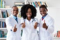 African american doctor and general practitioner and nurse as medical team Royalty Free Stock Photo