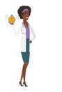 African-american doctor holding alarm clock. Royalty Free Stock Photo