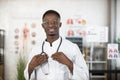 African american doctor holding stethoscope on neck Royalty Free Stock Photo