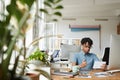 African-American Editor at Desk in Publishing Office