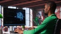 African american engineer coding a neural network AI brain model Royalty Free Stock Photo