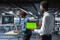 African american engineer uses chroma key display on tablet in data center Royalty Free Stock Photo