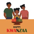African American family celebrating Kwanzaa. Royalty Free Stock Photo