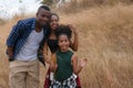 African american family, father, mother and daughter having fun together travel countryside Royalty Free Stock Photo