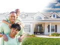 African American Family In Front of Drawing of New House Gradating Into Photograph.