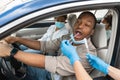 African American Family Getting Tested For Covid-19 Sitting In Car Royalty Free Stock Photo