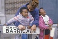 African-American family at the Mardis Gras parade, New Orleans, LA