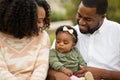 Happy African American family with their baby. Royalty Free Stock Photo