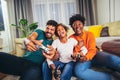 African American family playing video games together and having fun at home Royalty Free Stock Photo