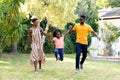 African American family spending time together in their garden. Royalty Free Stock Photo