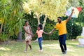 African American family spending time together in their garden. Royalty Free Stock Photo