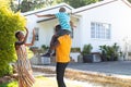 African American family spending time together in their garden. Royalty Free Stock Photo