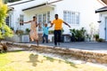 African American family spending time together in their garden. Royalty Free Stock Photo