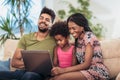 African american family using laptop at home Royalty Free Stock Photo