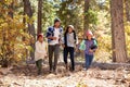 African American Family Walking Through Fall Woodland Royalty Free Stock Photo