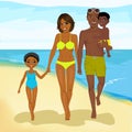 African american family walking happy along beach Royalty Free Stock Photo
