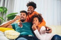 African american family watching tv together Royalty Free Stock Photo