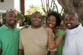 African American father and his adult children.