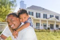 African American Father and Mixed Race Son, House Behind Royalty Free Stock Photo