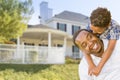 African American Father and Mixed Race Son, House Behind Royalty Free Stock Photo