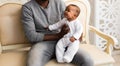 African American Father Playing With mixed race Baby Son Royalty Free Stock Photo