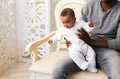 African American Father Playing With mixed race Baby Son Royalty Free Stock Photo