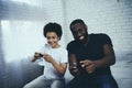 African American father with son plays video games Royalty Free Stock Photo