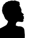 African American female, African profile picture, silhouette. girl from the side with short hair, Afro hair Royalty Free Stock Photo