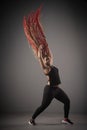 African American female dancing hip-hop with her hair in the air Royalty Free Stock Photo