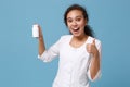 African american female doctor woman in medical gown showing thumb up, holding tablets, aspirin pills in bottle isolated Royalty Free Stock Photo