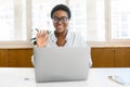 African-American female office employee using laptop Royalty Free Stock Photo