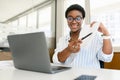 African-American female office employee using laptop Royalty Free Stock Photo