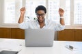 African-American female office employee using laptop Royalty Free Stock Photo