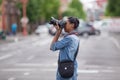 African American female photographer with Canon camera Royalty Free Stock Photo