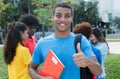 African american female student with group of multiethnic students Royalty Free Stock Photo