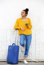 African american female traveler standing outdoors