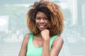 African american girl with amazing hairstyle in the city Royalty Free Stock Photo