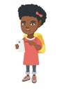 African girl with backpack pointing at cellphone. Royalty Free Stock Photo