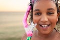 African American Girl on a Beach with Goggles and Snorkel Royalty Free Stock Photo