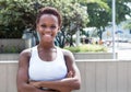 African american girl with crossed arms and short hair Royalty Free Stock Photo