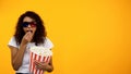 African-American girl in 3d glasses with popcorn watching comedy show, template