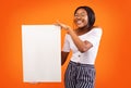 African American Girl Holding Blank Board Standing In Studio, Mockup Royalty Free Stock Photo