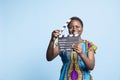 African american girl posing with clapperboard in front of camera Royalty Free Stock Photo