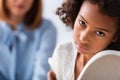 African american girl with psychologist on