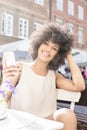 African american girl relaxing at cafe. Royalty Free Stock Photo